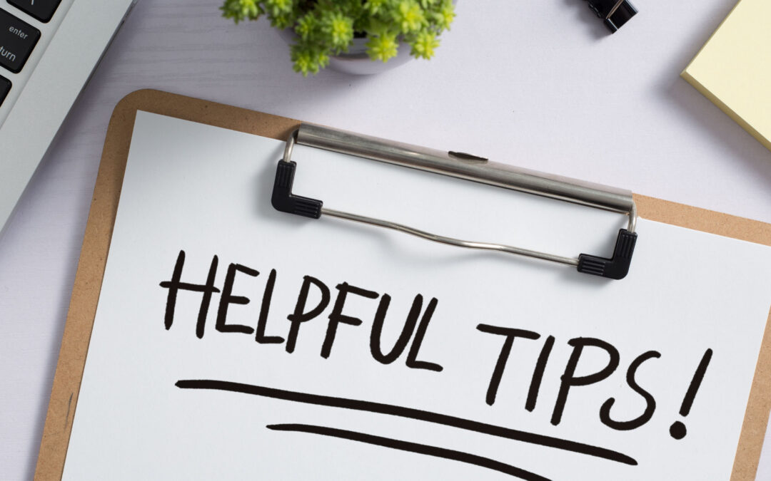 The phrase Helpful Tips written on a clipboard